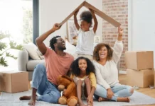 Family Matters in Islam: Rights and Responsibilitiesخاندانی معاملات: اسلام میں حقوق و ذمہ داریاں Happy family sitting together and forming a roof shape with cardboard while moving into a new home.